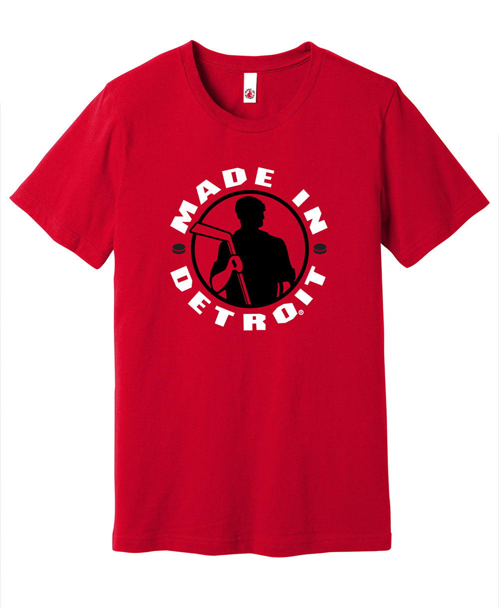 Made In Detroit Wrenchman holding a hockey stick. Printed in black/white on Red T-shirt