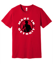 Made In Detroit Wrenchman holding a hockey stick. Printed in black/white on Red T-shirt